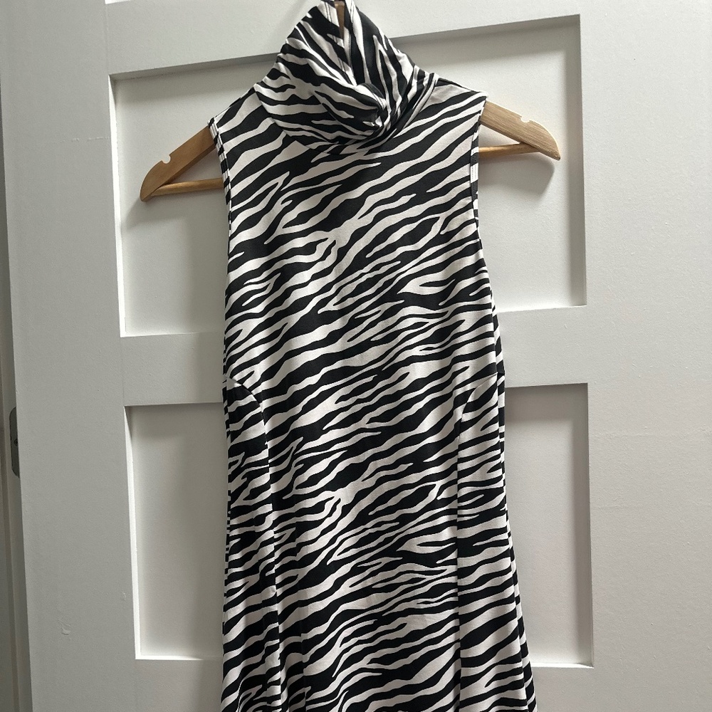 Ellabelle Tennis dress size 2, really 6-8 (medium) in perfect condition.